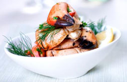 Consumir  pescados y mariscos controla la cardiopatía coronaria